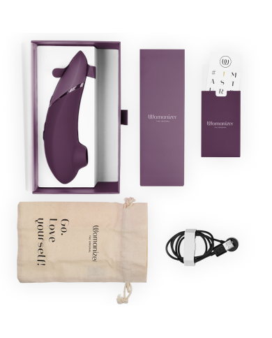 WOMANIZER - STIMULATEUR CLITORIAL SUIVANT VIOLET FONCÉ